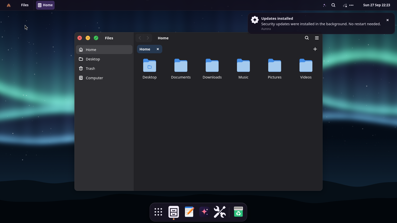 The Aurora OS desktop with the menu bar, dock and Files app