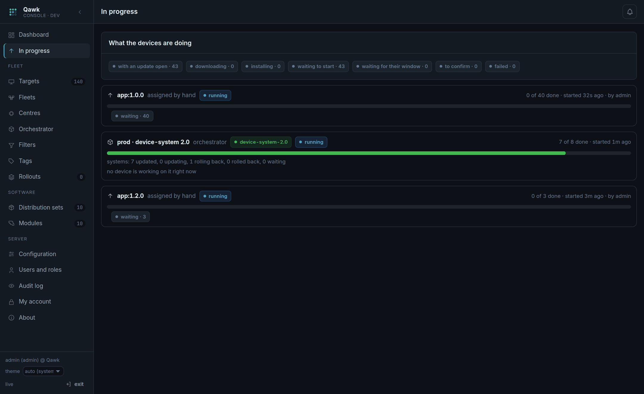 The In progress screen listing devices currently updating, with download progress bars.
